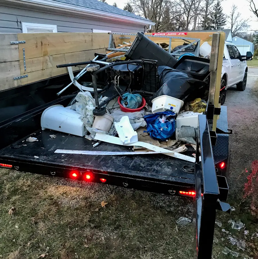 Roll-off dumpster delivered to a residential driveway in Forest Park
